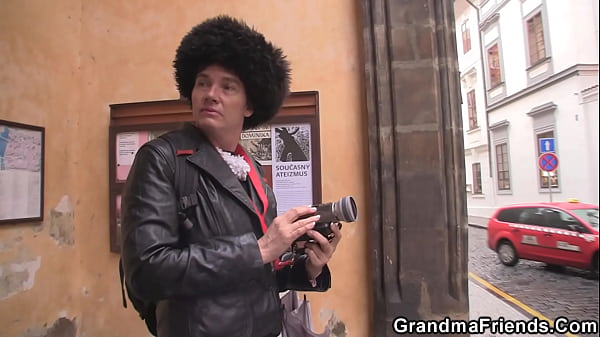 Hairy brunette granny takes two cocks